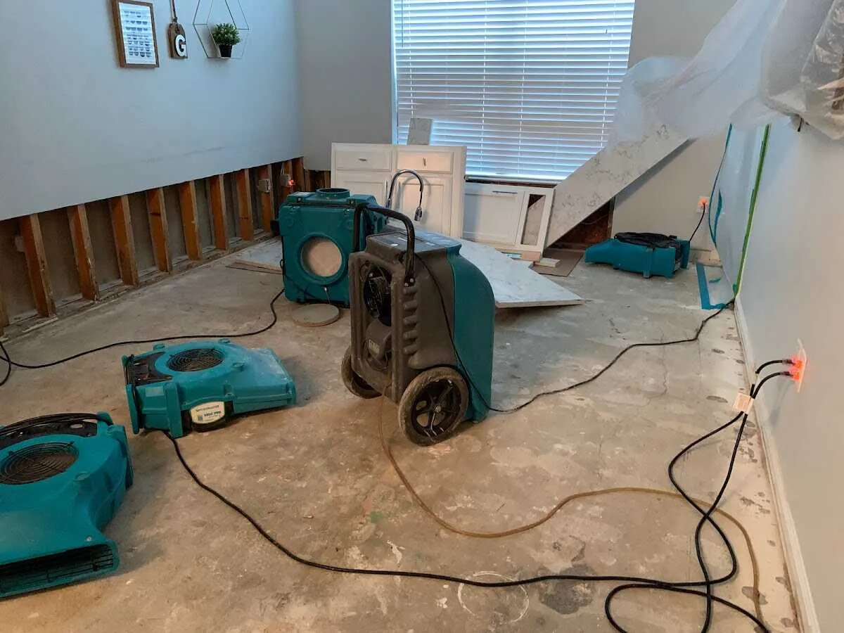Dehumidifier in flood-cut room for Water Damage Restoration in Paramount